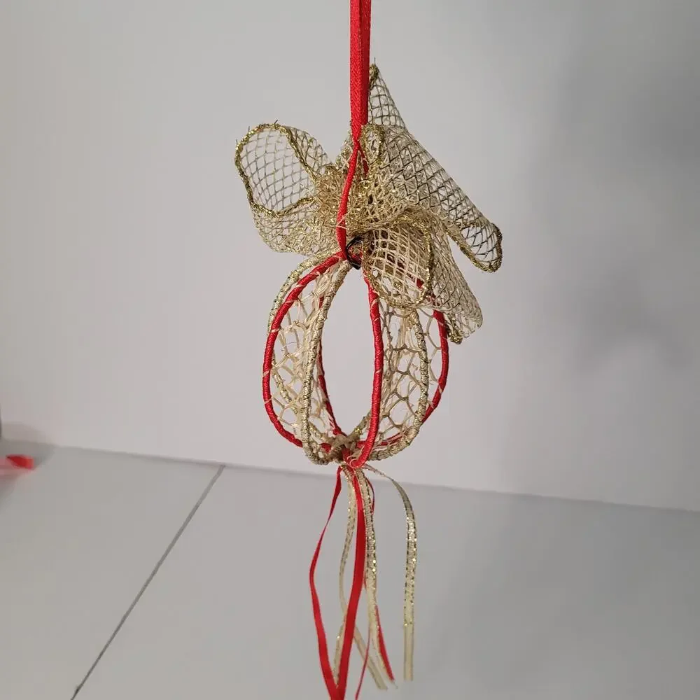 Festive Ornament with Gold Ribbon and Tassels